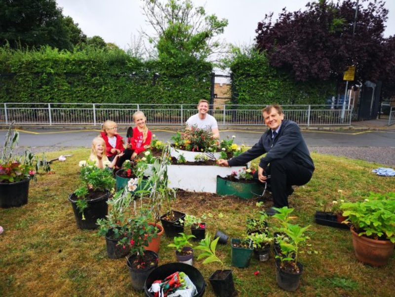 School Road planting flowers