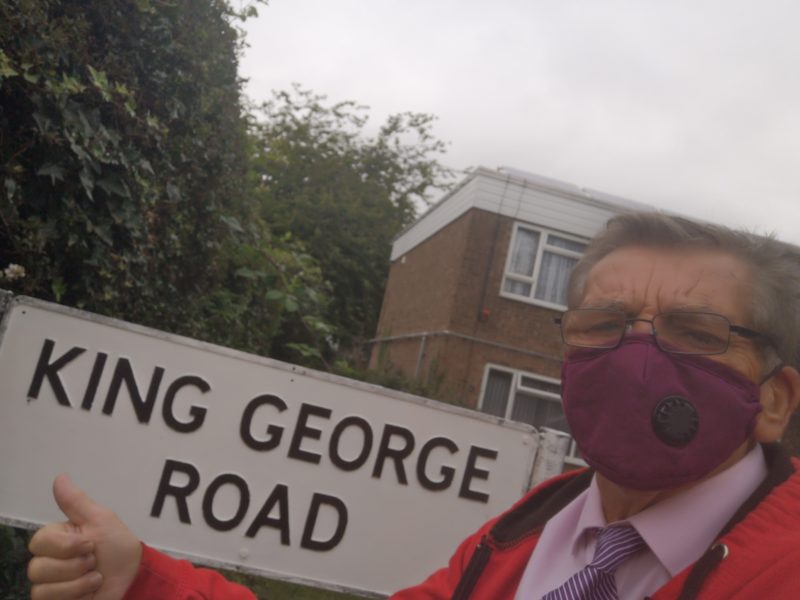 re paint King George Road sign